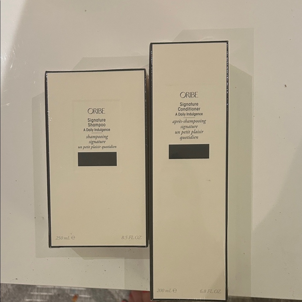 Oribe Signature Haircare shampoo and conditioner brand new , sealed!